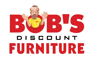 Logo for Bob's Discount Furniture featuring a cartoon man in a yellow shirt with raised hands above the words 